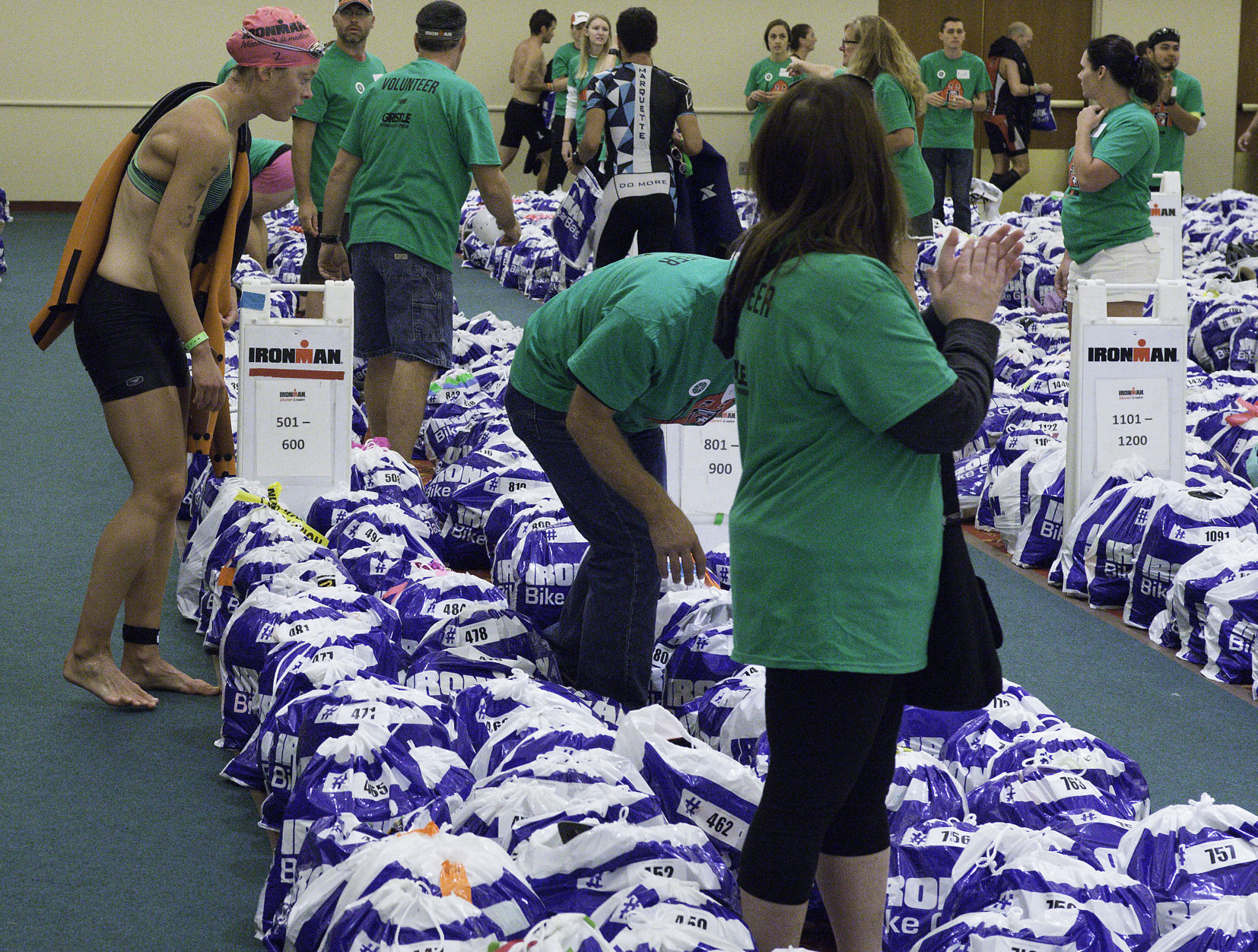 IRONMAN volunteers help athletes
